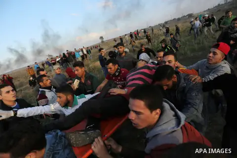 Palestinian protesters clash with Israeli security forces near the border fence with Israel, east of Gaza City on December 15, 2017 as demonstrations continue over US President Donald Trump's declaration of Jerusalem as...