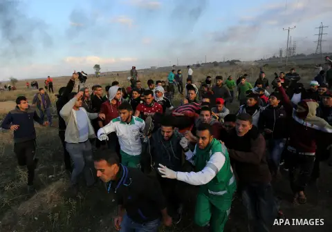 Palestinian protesters clash with Israeli security forces near the border fence with Israel, east of Gaza City on December 15, 2017 as demonstrations continue over US President Donald Trump's declaration of Jerusalem as...