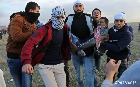 Palestinian protesters clash with Israeli security forces near the border fence with Israel, east of Gaza City on December 15, 2017 as demonstrations continue over US President Donald Trump's declaration of Jerusalem as...