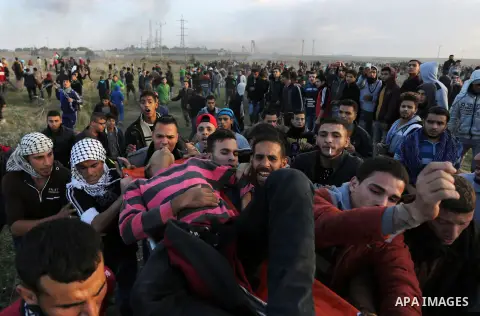 Palestinian protesters clash with Israeli security forces near the border fence with Israel, east of Gaza City on December 15, 2017 as demonstrations continue over US President Donald Trump's declaration of Jerusalem as...