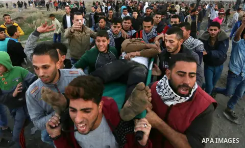 Palestinian protesters clash with Israeli security forces near the border fence with Israel, east of Gaza City on December 15, 2017 as demonstrations continue over US President Donald Trump's declaration of Jerusalem as...