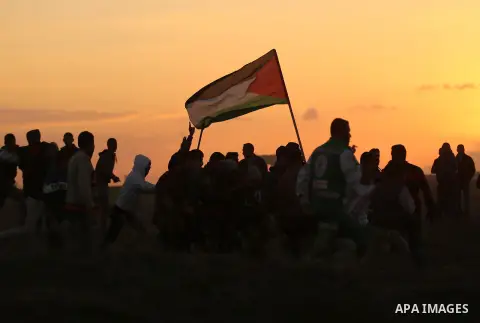 Palestinian protesters clash with Israeli security forces near the border fence with Israel, east of Gaza City on December 15, 2017 as demonstrations continue over US President Donald Trump's declaration of Jerusalem as...