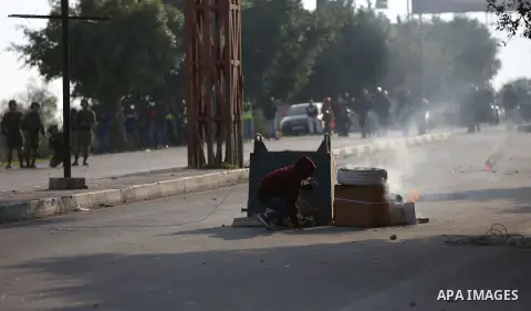 Israeli border clash with Palestinian protesters near the Huwara checkpoint, south of Nablus in the Israeli-occupied West Bank, on December 15, 2017, as protests continue in the region amid anger over US President Donald...