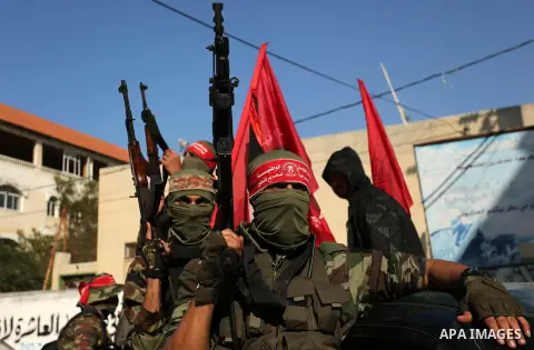 Palestinian militants take part the funeral of 29-year-old Ibrahim Abu Thurayeh in Gaza City on December 16, 2017 after he was shot dead in clashes between Israeli forces and protesters along the Gaza-Israel border, as c...
