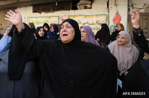 Palestinian relatives of 29-year-old Ibrahim Abu Thurayeh mourn during his funeral in Gaza City on December 16, 2017 after he was shot dead in clashes between Israeli forces and protesters along the Gaza-Israel border, a...