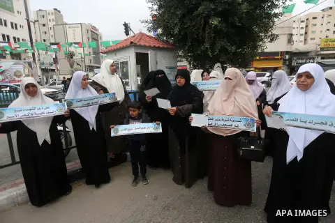 Palestinian supporters of Hamas movement take part in a protest against Trump's decision to recognize Jerusalem as the capital of Israel, in Gaza city, on December 18, 2017. Photo by Mohammed Asad