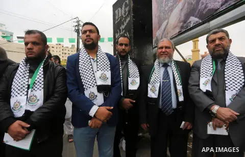Palestinian supporters of Hamas movement take part in a protest against Trump's decision to recognize Jerusalem as the capital of Israel, in Gaza city, on December 18, 2017. Photo by Mohammed Asad