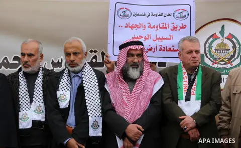 Palestinian supporters of Hamas movement take part in a protest against Trump's decision to recognize Jerusalem as the capital of Israel, in Gaza city, on December 18, 2017. Photo by Mohammed Asad
