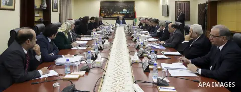 Palestinian Prime Minister Rami Hamdallah chairs a meeting of council of Ministers in the West Bank city of Ramallah on December 19, 2017. Photo by Prime Minister Office