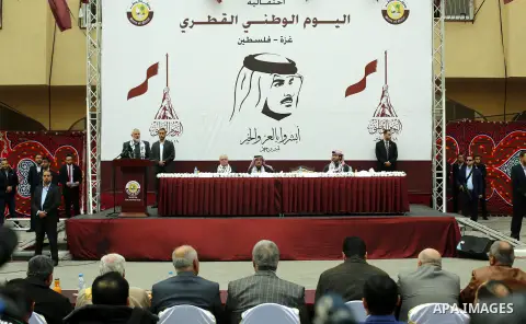 Qatar's Ambassador to the Palestinian Authority, Mohammed Al Emadi and Hamas Chief Ismail Haniyeh attend Qatar's National Day celebrations, in Khan Younis in the southern of Gaza strip, on December 19, 2017. Photo by Ram...