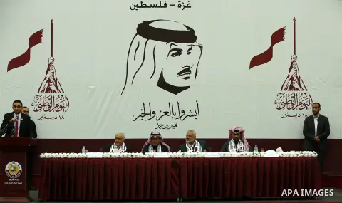 Qatar's Ambassador to the Palestinian Authority, Mohammed Al Emadi and Hamas Chief Ismail Haniyeh attend Qatar's National Day celebrations, in Khan Younis in the southern of Gaza strip, on December 19, 2017. Photo by Ram...