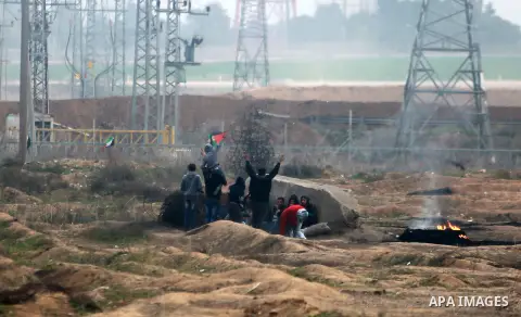 Palestinian protesters clash with Israeli security forces near the Israel-Gaza border east of Gaza City on December 20, 2017, as demonstrations continue over the US president's controversial recognition of Jerusalem as I...