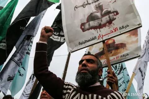 Palestinian demonstrators take part during a protest against U.S. President Donald Trump's decision to recognise Jerusalem as the capital of Israel, in Gaza City December 20, 2017. Photo by Mohammed Dahman