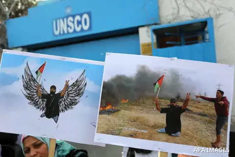 Disabled Palestinians take part in a protest against the killing of Ibraheem Abu Thuraya in front of the headquarter United Nation "UNESCO", in Gaza City, on December 21, 2017. Abu Thuraya, who was shot dead by Israeli s...