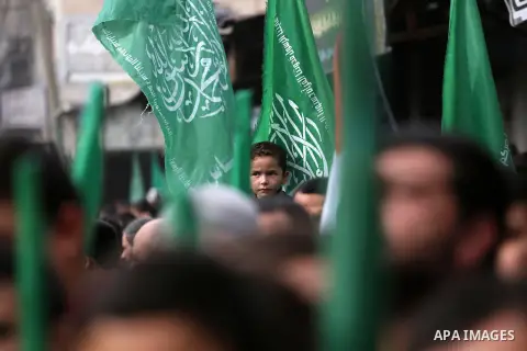 Palestinian supporters Hamas movement take part during a protest against U.S. President Donald Trump's decision to recognise Jerusalem as the capital of Israel, in Jabalia refugee camp in the northern Gaza strip on Decem...