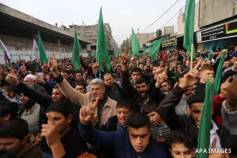 Palestinian supporters Hamas movement take part during a protest against U.S. President Donald Trump's decision to recognise Jerusalem as the capital of Israel, in Jabalia refugee camp in the northern Gaza strip on Decem...