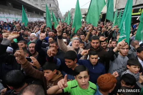 Palestinian supporters Hamas movement take part during a protest against U.S. President Donald Trump's decision to recognise Jerusalem as the capital of Israel, in Jabalia refugee camp in the northern Gaza strip on Decem...