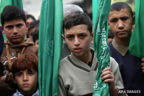 Palestinian supporters Hamas movement take part during a protest against U.S. President Donald Trump's decision to recognise Jerusalem as the capital of Israel, in Jabalia refugee camp in the northern Gaza strip on Decem...