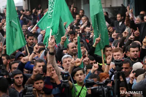 Palestinian supporters Hamas movement take part during a protest against U.S. President Donald Trump's decision to recognise Jerusalem as the capital of Israel, in Jabalia refugee camp in the northern Gaza strip on Decem...