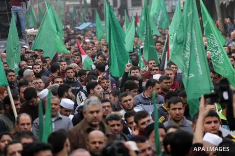 Palestinian supporters Hamas movement take part during a protest against U.S. President Donald Trump's decision to recognise Jerusalem as the capital of Israel, in Jabalia refugee camp in the northern Gaza strip on Decem...