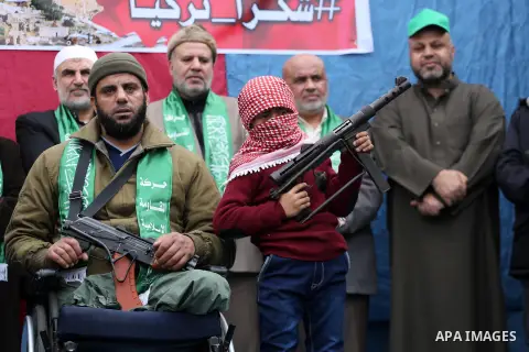 Palestinian supporters Hamas movement take part during a protest against U.S. President Donald Trump's decision to recognise Jerusalem as the capital of Israel, in Jabalia refugee camp in the northern Gaza strip on Decem...