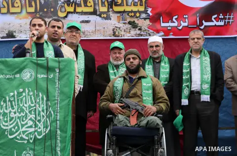 Palestinian supporters Hamas movement take part during a protest against U.S. President Donald Trump's decision to recognise Jerusalem as the capital of Israel, in Jabalia refugee camp in the northern Gaza strip on Decem...
