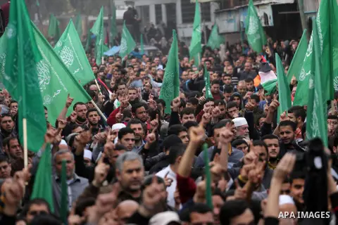 Palestinian supporters Hamas movement take part during a protest against U.S. President Donald Trump's decision to recognise Jerusalem as the capital of Israel, in Jabalia refugee camp in the northern Gaza strip on Decem...