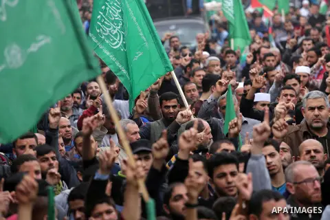 Palestinian supporters Hamas movement take part during a protest against U.S. President Donald Trump's decision to recognise Jerusalem as the capital of Israel, in Jabalia refugee camp in the northern Gaza strip on Decem...