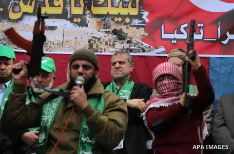 Palestinian supporters Hamas movement take part during a protest against U.S. President Donald Trump's decision to recognise Jerusalem as the capital of Israel, in Jabalia refugee camp in the northern Gaza strip on Decem...