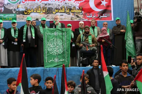Palestinian supporters Hamas movement take part during a protest against U.S. President Donald Trump's decision to recognise Jerusalem as the capital of Israel, in Jabalia refugee camp in the northern Gaza strip on Decem...