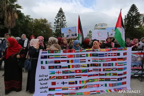 Palestinian women take part during a protest against U.S. President Donald Trump's decision to recognise Jerusalem as the capital of Israel, in Gaza City December 24, 2017. Photo by Ashraf Amra