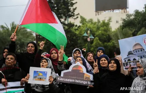 Palestinian women take part during a protest against U.S. President Donald Trump's decision to recognise Jerusalem as the capital of Israel, in Gaza City December 24, 2017. Photo by Mohammed Dahman
