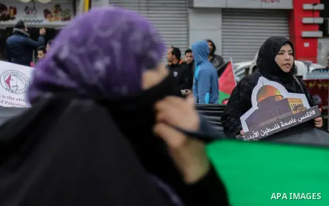 Palestinian women take part during a protest against U.S. President Donald Trump's decision to recognise Jerusalem as the capital of Israel, in Gaza City December 24, 2017. Photo by Mohammed Dahman