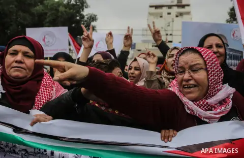 Palestinian women take part during a protest against U.S. President Donald Trump's decision to recognise Jerusalem as the capital of Israel, in Gaza City December 24, 2017. Photo by Mohammed Dahman