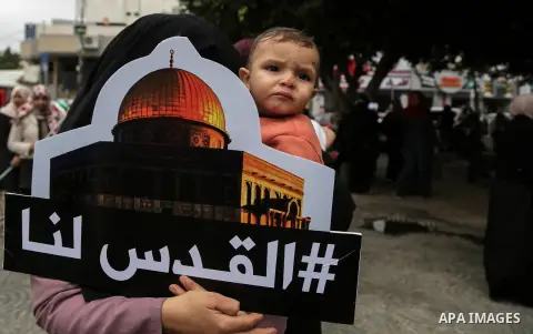 Palestinian women take part during a protest against U.S. President Donald Trump's decision to recognise Jerusalem as the capital of Israel, in Gaza City December 24, 2017. Photo by Mohammed Dahman