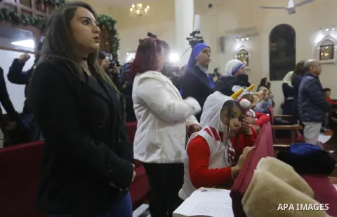Palestinian Christians attend a Sunday mass on Christmas Eve at the Der Latin church in Gaza City, 24 December 2017. Photo by Mohammed Asad