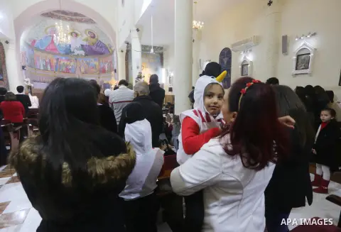 Palestinian Christians attend a Sunday mass on Christmas Eve at the Der Latin church in Gaza City, 24 December 2017. Photo by Mohammed Asad