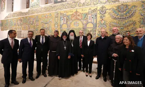 Palestinian Prime Minister, Rami Hamdallah, attends a Christmas midnight mass at the Church of the Nativity in the West Bank city of Bethlehem, December 24, 2017. Photo by Prime Minister Office
