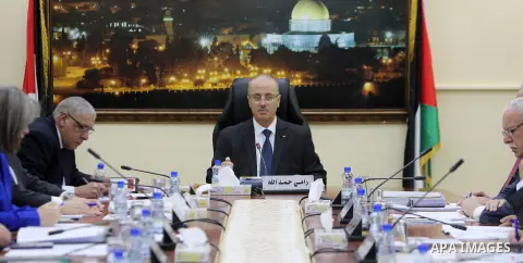 Palestinian Prime Minister, Rami Hamdallah, chairs a meeting of of council of Ministers in the West Bank city of Ramallah on December 27, 2017. Photo by Prime Minister Office