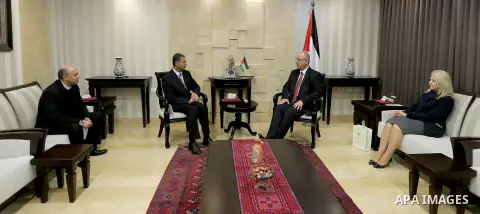 Palestinian Prime Minister, meets with Egyptian Ambassador to Palestine Sami Murad, in the West Bank city of Ramallah, on December 028, 2017. Photo by Prime Minister Office