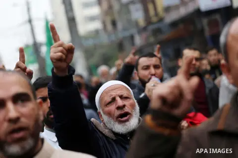 Palestinians take part during a protest against U.S. President Donald Trump's decision to recognise Jerusalem as the capital of Israel, in Gaza City December 29, 2017. Photo by Mohammed Asad