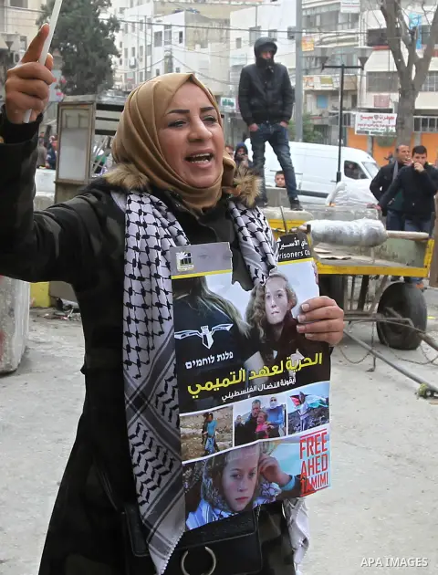 Palestinian demonstrators clash with Israeli security forces in the occupied West Bank city of Hebron on December 29, 2017 as protests continue over US President Donald Trump's declaration of Jerusalem as Israel's capita...