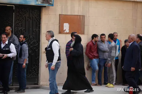 Priest David, the head of Mar Mina church arrives to the site of a gun attack on Mar Mina church in Helwan district on the outskirts of Cairo, on December 29, 2017. A gunman opened fire on a church, killing at least nine...