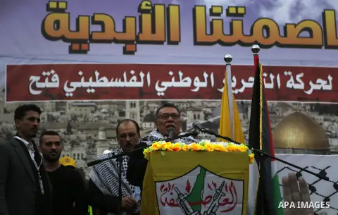 Leader of Fatah movement, Ahmed Helles, speaks during a rally in Gaza City on December 31, 2017, marking the 53rd anniversary of the creation of the political party. Photo by Mohammed Dahman