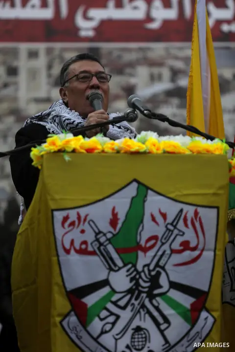 Leader of Fatah movement, Ahmed Helles, speaks during a rally in Gaza City on December 31, 2017, marking the 53rd anniversary of the creation of the political party. Photo by Mohammed Dahman