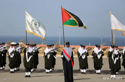 Palestinian police women show their skills during a graduation ceremony, in Gaza city on January 22, 2018. Photo by Atia Darwish