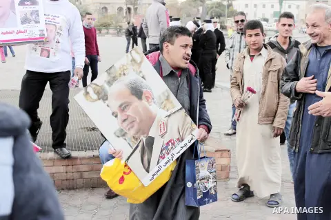 Supporters of Egyptian President Abdel Fattah al-Sisi participate in a rally held on the National Police Day that coincides with the anniversary of the Jan. 25 protests that toppled former long-time leader Hosni Mubarak...