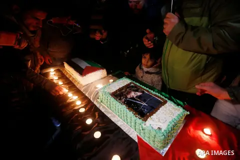 Palestinians take part in a symbolic birthday party for Palestinian teen Ahed Tamimi, who is detained by Israel, in the West Bank city of Hebron January 30, 2018. Photo by Wisam Hashlamoun