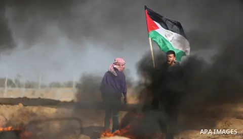 Palestinian protesters clash with Israeli security forces, against US President Donald Trump's decision to recognise Jerusalem as the capital of Israel, near the border with Israel in the southern Gaza Strip on February...