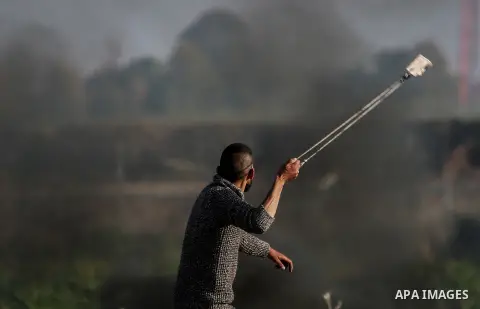 Palestinian protesters clash with Israeli security forces near the border with Israel, east of Gaza City on February 2, 2018 as demonstrations continue over the US president's controversial recognition of Jerusalem as Is...